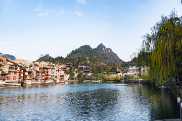 Fototapeta premium Panoramic Winter Sunset Scenery of Zhenyuan Ancient Town in Qiandongnan, Guizhou, China