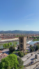 Obraz premium Aerial drone view Florence Lungarni Arno River banks with historic buildings colorful facades Ponte Vecchio and Tuscan cityscape