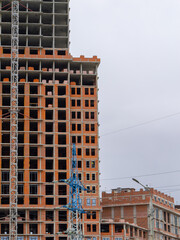 Obraz premium Tall Urban Tower Under Construction