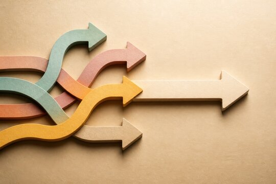 Colorful arrows diverging on beige background representing choice direction and decision making