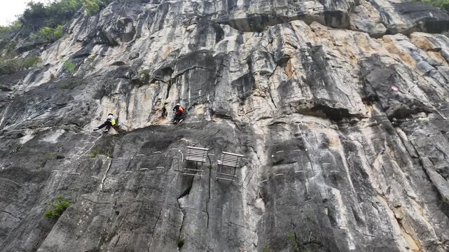  Technical Rock Climbing on Karst Tower, Climbers Placing Gear, Aerial View
