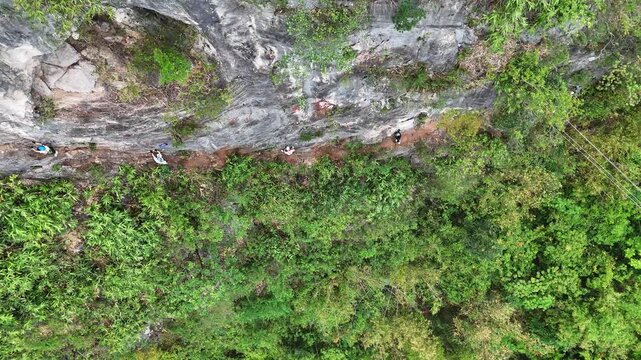  Single Pitch Rock Climbing on Limestone Karst Face, Climbers Using Rope and Protection