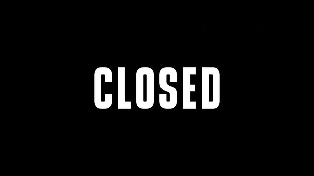 Bold 'CLOSED' Sign Against a Dark Background