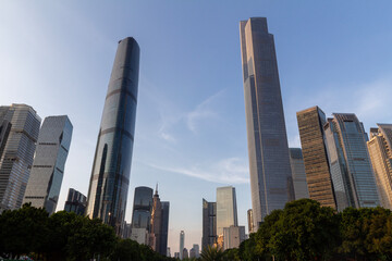 Obraz premium the morden skyscrapers in guangzhou huacheng square at sunset