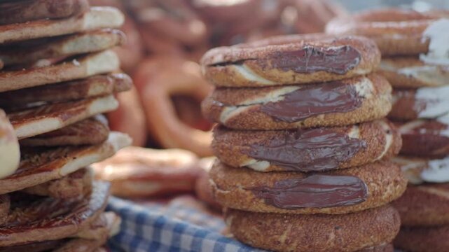 stack of turkish simits on a table selling at the market 