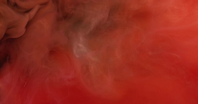 Paint background. Color fog water. Blur red orange chemical splash pigment glitter texture fluid spreading on art underwater abstraction.