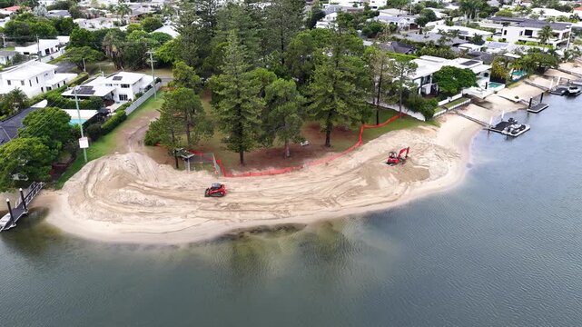 Aerial View of Excavators Renovating a Canal Beach in Gold Coast