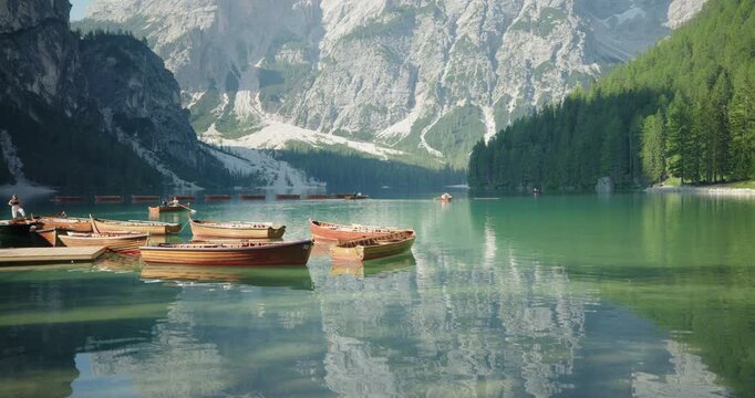 Wooden boats at Braies Lake, Dolomites, Italy
