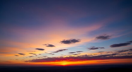 Fototapeta premium Vibrant sunset with orange and purple hues in the sky