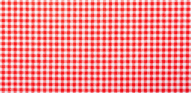 above of placemat fabric cloth or arrangement of gingham-patterned red fabrics background. food decoration menu design.