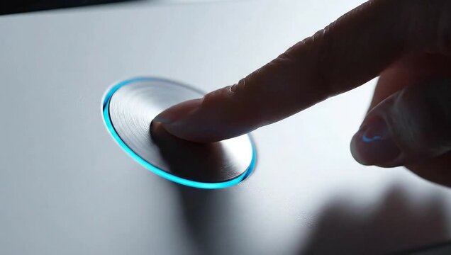 Finger Pressing Illuminated Button - Modern Technology Interaction.