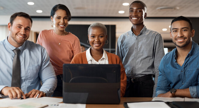 Diversity, laptop and portrait of business people in office together for about us or project management. Computer, teamwork and smile of employee group in workplace for inclusion, solidarity or unity