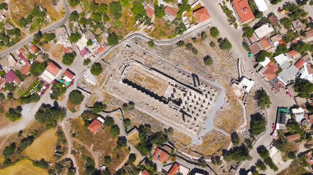 Didim, Turkey. Aerial drone view of the monumental Temple of Apollo at Didyma, detail of massive Ionic columns and ruins on a sunny summer day. Aerial View, HEAD OVER SHOT with rotation