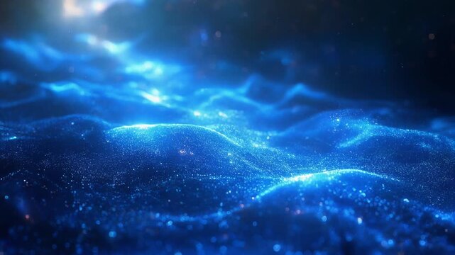青い光線ときらめく粒子が広がる幻想的な海中風抽象背景 グラデーション輝きテクスチャ