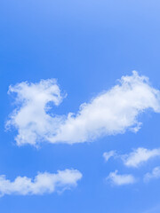 Fototapeta premium Beautiful, bright, cloudy blue sky background with many clouds, sunny weather during daytime in hot summer