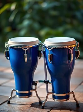a pair of blue bongo drums
