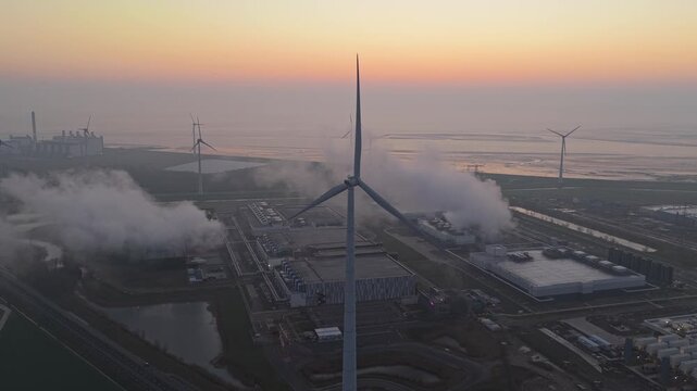 Aerial view of the google hyperscale data center in eemshaven, netherlands, powered by renewable wind energy at sunrise, fueling ai