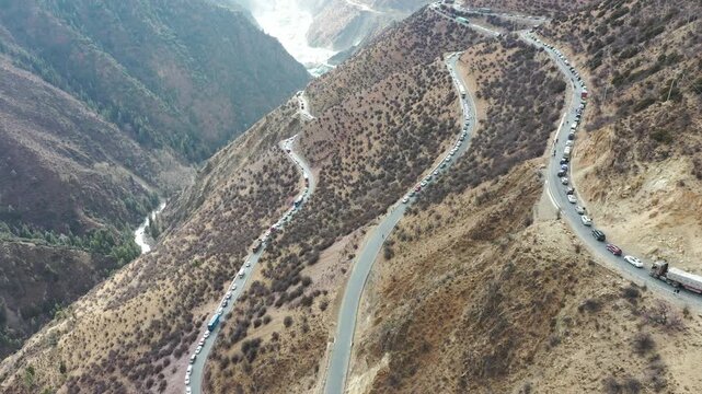 Traffic on Winding Mountain Road in Himalayan Valley