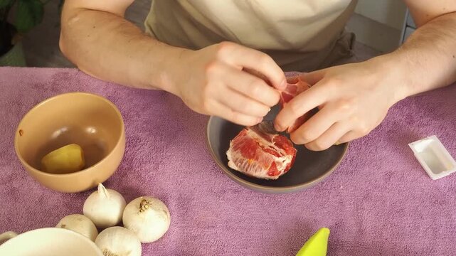 a man peels an orange