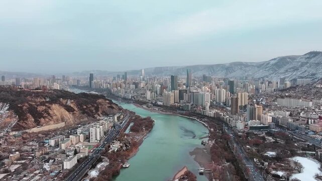 Lanzhou skyline along the Yellow River in winter