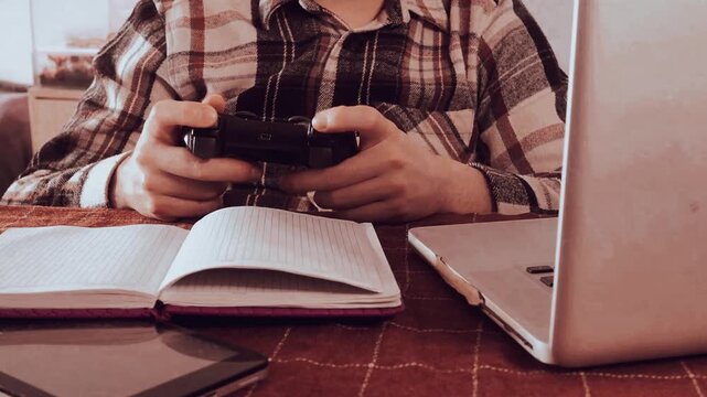 a man playing a console