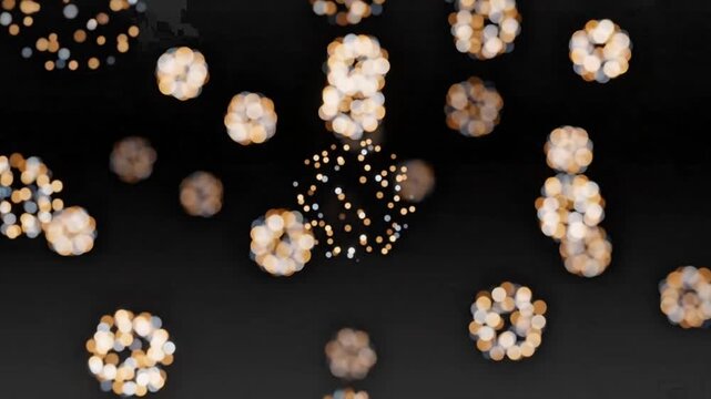 Abstract microscopic view of numerous light-colored cellular or particulate clusters against a dark background, suggesting biological activity or chemical reactions.