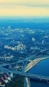 Vertical video. Ufa, Russia. Panorama of the central part of the city of Ufa. Time after sunset. Drone footage. Rich colors