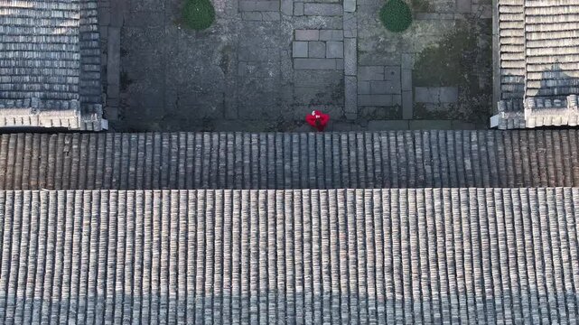 Aerial View of Weathered Tiled Rooftops