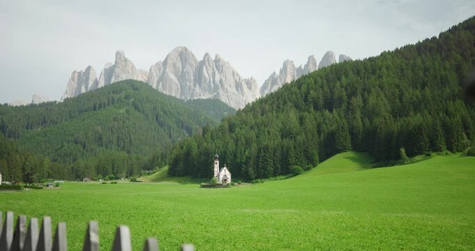 St. John Church with Odle mountains behind, Funes Valley, Dolomites, Italy