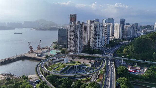 Hong Kong Waterfront Skyline with Curved Highway Loop