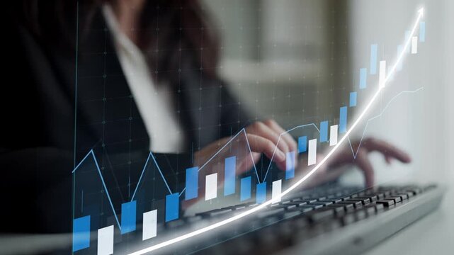 A focused businesswoman analyzes data trends on her computer, showcasing upward graphs and metrics, symbolizing financial growth and success in a modern office setting. Copula
