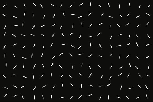 Long grain rice pattern on black background