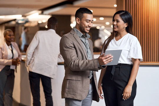 Tablet, team or business people in lobby for conference, speaker coordination or schedule discussion. Review, speaking or event planner with tech for seminar organization, trade show agenda or smile
