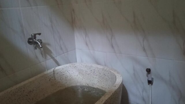 video of bathroom and bathtub with sunlight lighting from outside