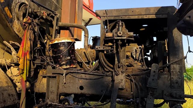 Aged asphalt paver engine, outdoor Chiangmai Thailand.