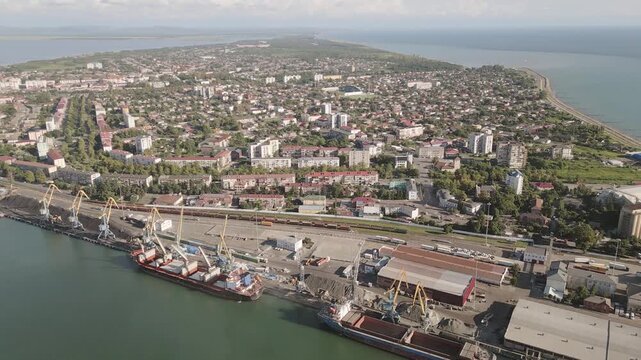Aerial panorama Poti cityscape, black sea port, residential blocks, mixed uses, roads and parks, waterfront real estate, summer daylight panorama