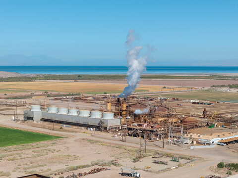 Aerial view geothermal power plant emitting steam near the Salton Sea