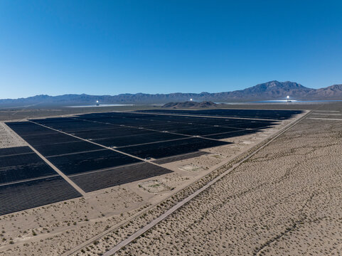 Aerial landscape of a massive solar panel field in the Mojave Desert