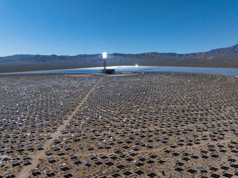 Aerial vista concentrated solar thermal plant thousands of mirrors