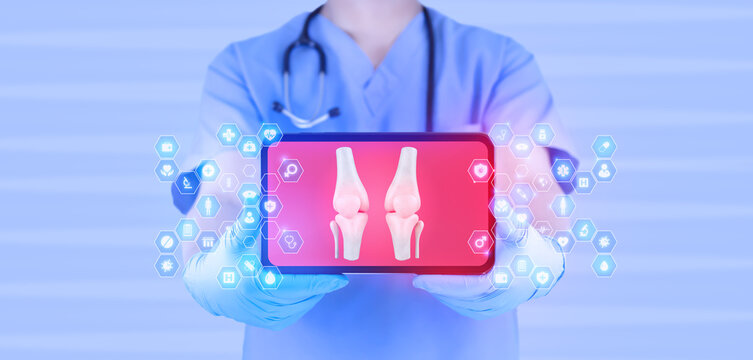 Medical software interface on a tablet, orthopedic monitoring, and teleconsultation. Digital diagnosis of patellar alignment. mHealth applied to the knee. The doctor examines the joint on their tablet