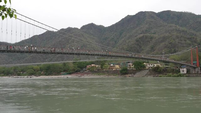 Ram Jhula Suspension Bridge over Ganges River in Rishikesh India