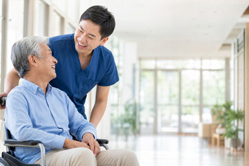 Obraz premium Caregiver supporting senior person with copy space, healthcare and elderly care concept