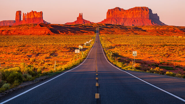 Red cliffs of Monument Valley in Utah, looking south on U.S. Route 163  north of the Utah&ndash;Arizona state line also known as Forrest Gump point early in the morning sunrise.