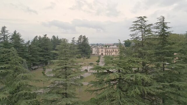Aerial panning view Dadiani Palace Museum Zugdidi, 19th century neogothic residence with park, Samegrelo landmark &mdash; concepts: heritage, culture, history, tourism, architecture, education, museum