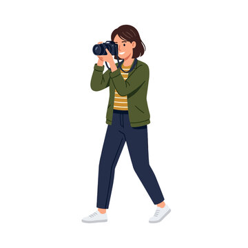 A person holding a camera, capturing a moment or scene with professional photography equipment and a creative passion for visuals