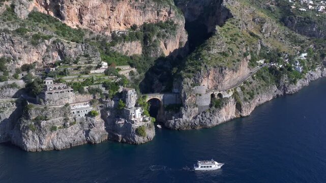 Aerial Shot of Fiordo di Furore, Fjord of Furore. Azure Water, Cliffs, Big Canyon, famous bridge in Amalfi coast, Italy
