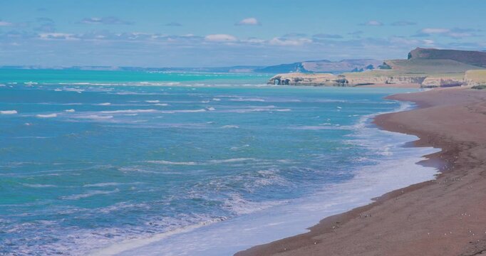 4K video; Atlantic coast with pebble beach and sea in southern Argentina