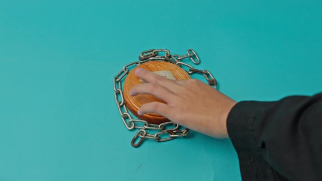Hand Places "Press" And "Freedom" Labels Onto Wooden Judge'S Sound Block Encircled Metal Chains For Legal Struggle For Media Rights