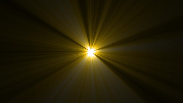 Golden volumetric light rays. Dramatic light rays emanating from center on black background. 