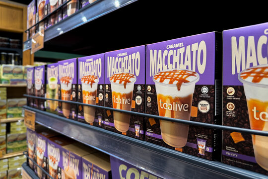 KUALA LUMPUR, MALAYSIA - FEB 01, 2026: Tealive Caramel Macchiato instant beverage boxes displayed on retail store shelf.